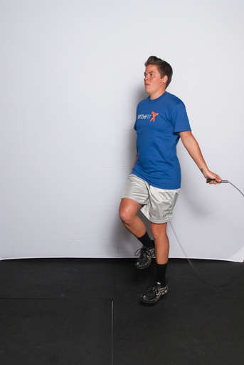 Lift one leg slightly off the ground, so that you are standing on one leg.
