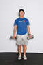 Hold a dumbbell in one hand so the dumbbell is resting in the palm of your hand. Let your arms hang at your sides.