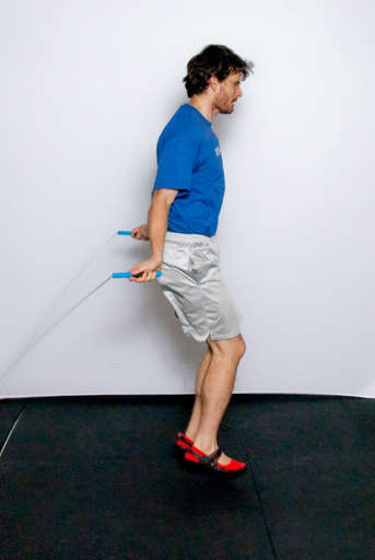 After the jump rope passes under your legs, continue to rotate the rope so that it passed under your feet a second time.