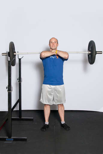 An alternate way to hold the bar is to cross your arms over each other in front of you. If you use this technique, make sure you keep your elbows up to keep the bar in place.
