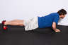 Bend your elbows, lowering your entire body towards the floor. Your body should be in a line, with your back straight.