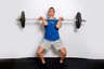 Catch the bar on your shoulders. Your feet should move out slightly so you land with your feet shoulder width apart.
