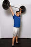 Finish by fully extending your legs while holding the bar overhead.