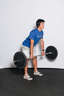 Extend your hips to lift the weight off the ground.