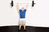 Continue extending until your arms are straight and the weight is overhead.