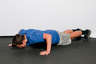 Lower your body until your chest, chin and quads touch the ground at the same time.